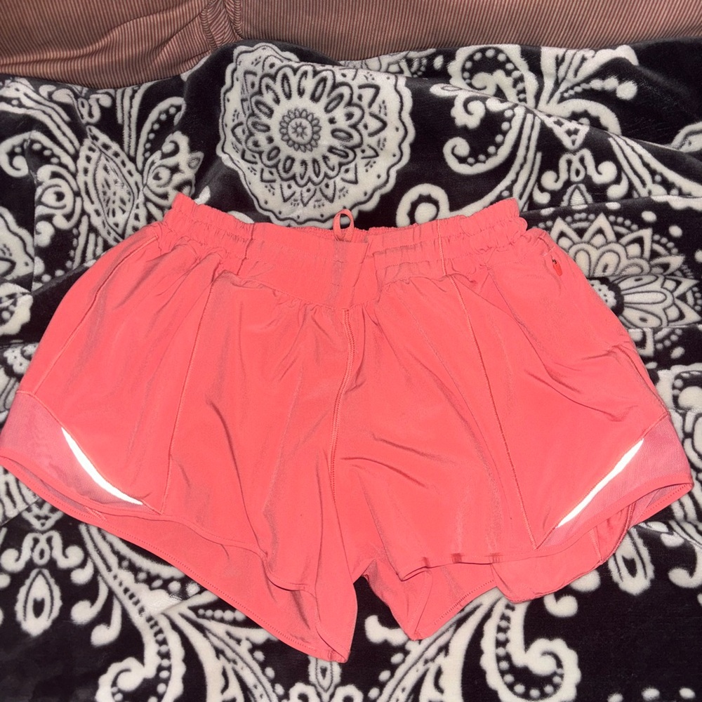 Lululemon Hotty Hot low rise lined shorts 4” size 10, color is raspberry cream